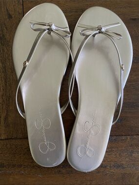 Jessica Simpson Gold Flip Flops